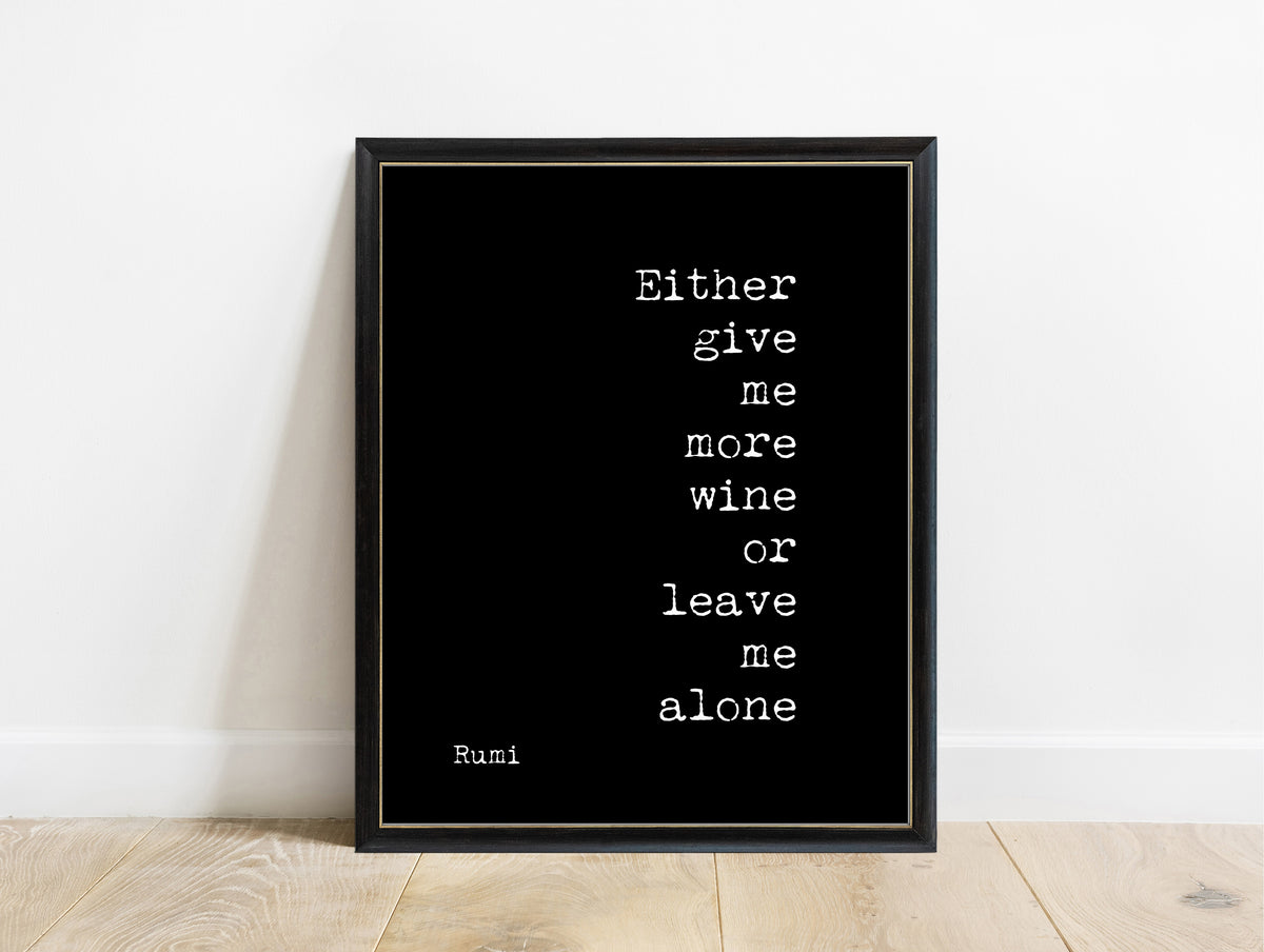Rumi Either Give Me More Wine stacked quote print in a black frame, black background