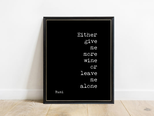 Rumi Either Give Me More Wine stacked quote print in a black frame, black background