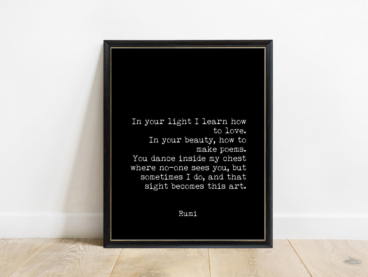 Rumi In Your Light quote print in a black frame, black background
