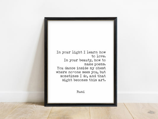 Rumi In Your Light quote print in a black frame, white background