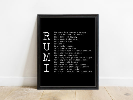 Rumi The Moon Has Become a Dancer poem print in a black frame, black background