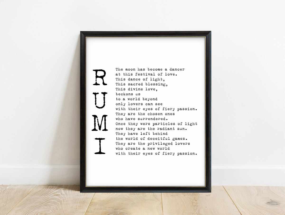 Rumi The Moon Has Become a Dancer poem print in a black frame, white background