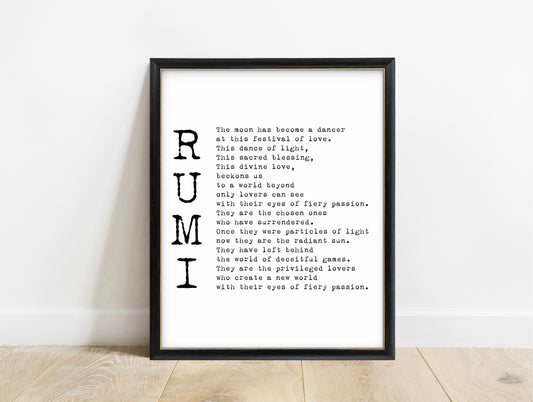 Rumi The Moon Has Become a Dancer poem print in a black frame, white background
