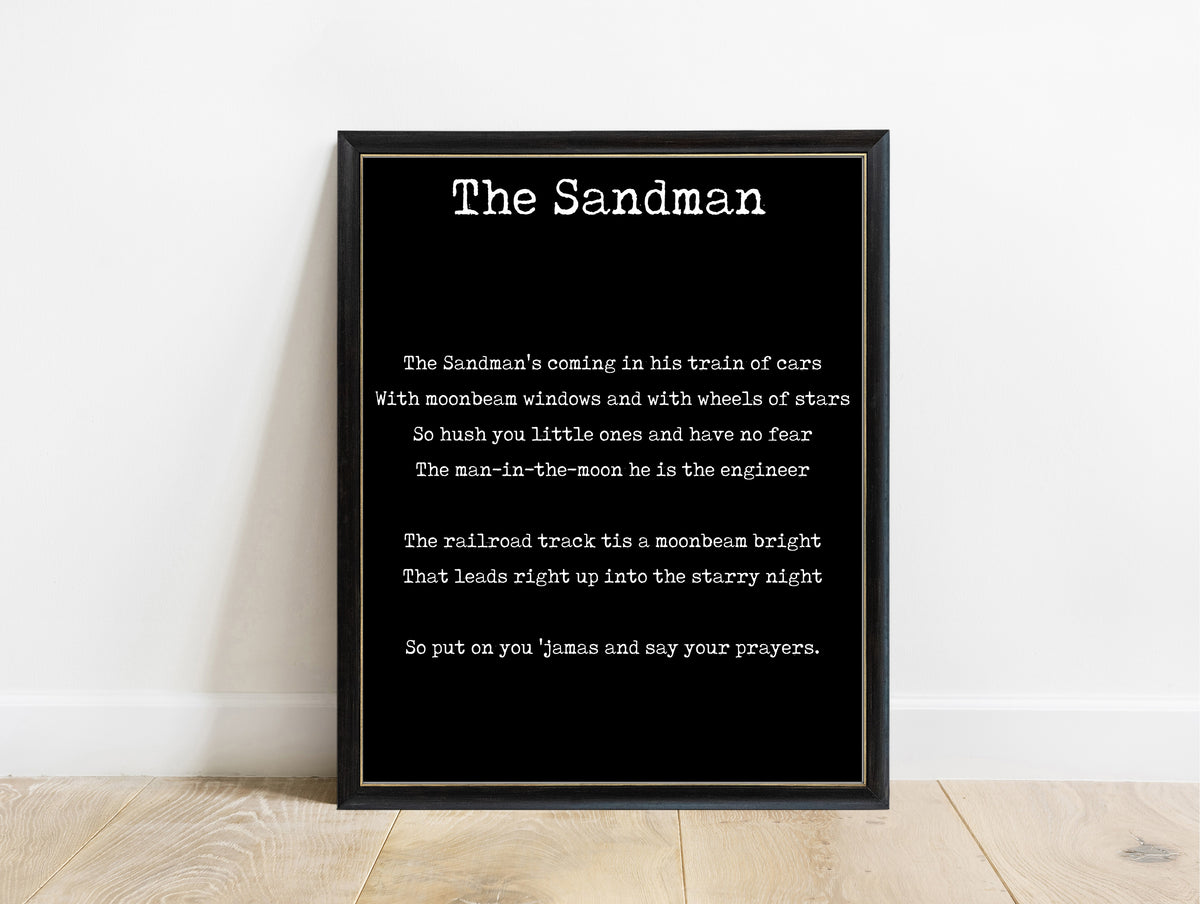 The Sandman train of cars lullaby nursery print in a black frame, black background