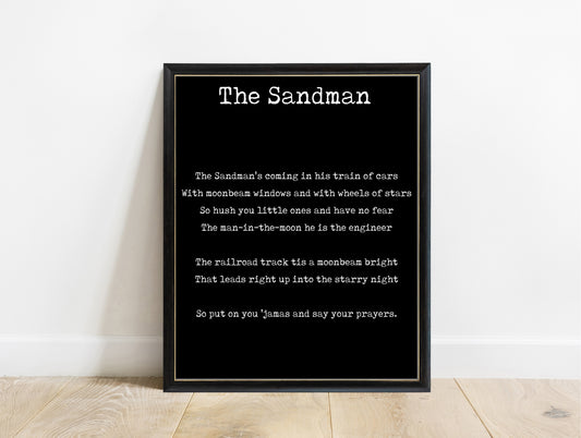 The Sandman train of cars lullaby nursery print in a black frame, black background