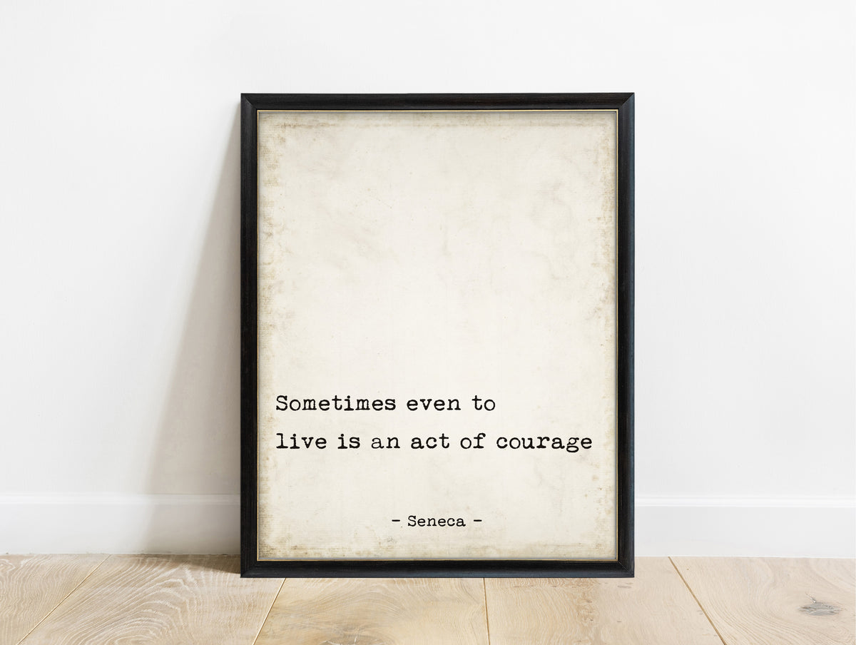 Seneca sometimes even to live is an act of courage typewriter quote print in a black frame, vintage background