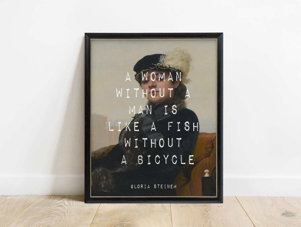 Gloria Steinem fish without a bicycle quote print, in a black frame