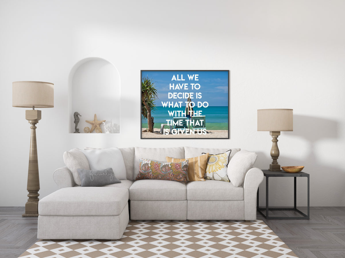 Tolkien All we have to decide is what to do with the time that is given us over a photograph of deckchairs on a beach in Thailand, shown framed in a living room