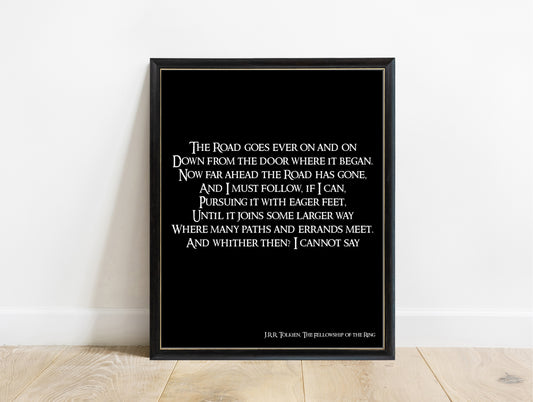 J.R.R. Tolkien the road goes ever on calligraphy print in a black frame, black background