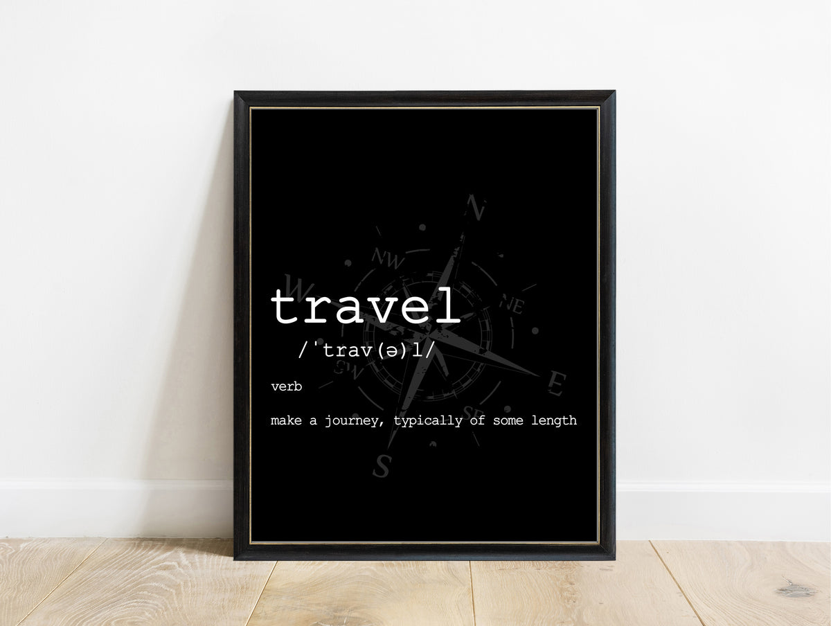 Travel dictionary definition print in a black frame, black background