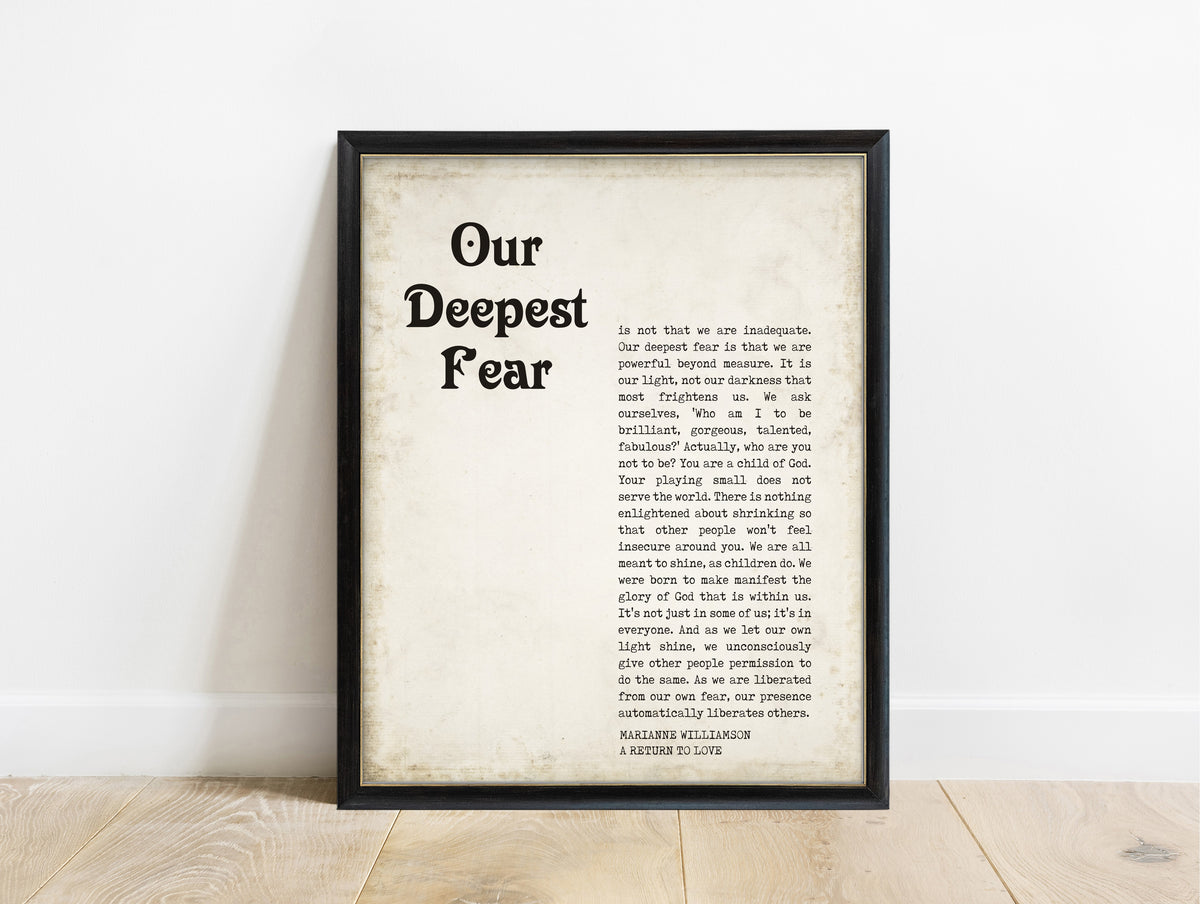 Marianne Williamson our deepest fear magazine style quote print in a black frame, vintage background