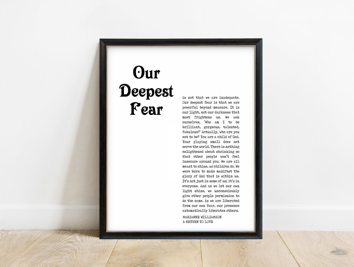 Marianne Williamson our deepest fear magazine style quote print in a black frame, white background