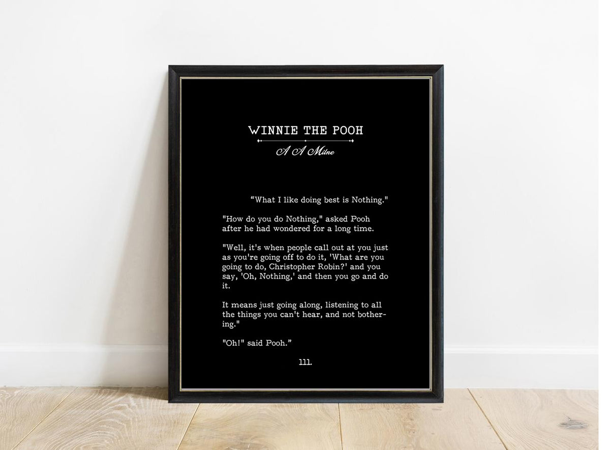 Winnie the Pooh What I Like Doing Best Is Nothing book page print in a black frame, black background