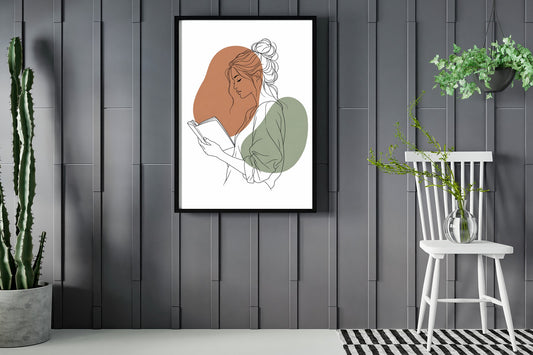 Woman reading a book, line art print with terracotta and sage shapes framed in a room with plants