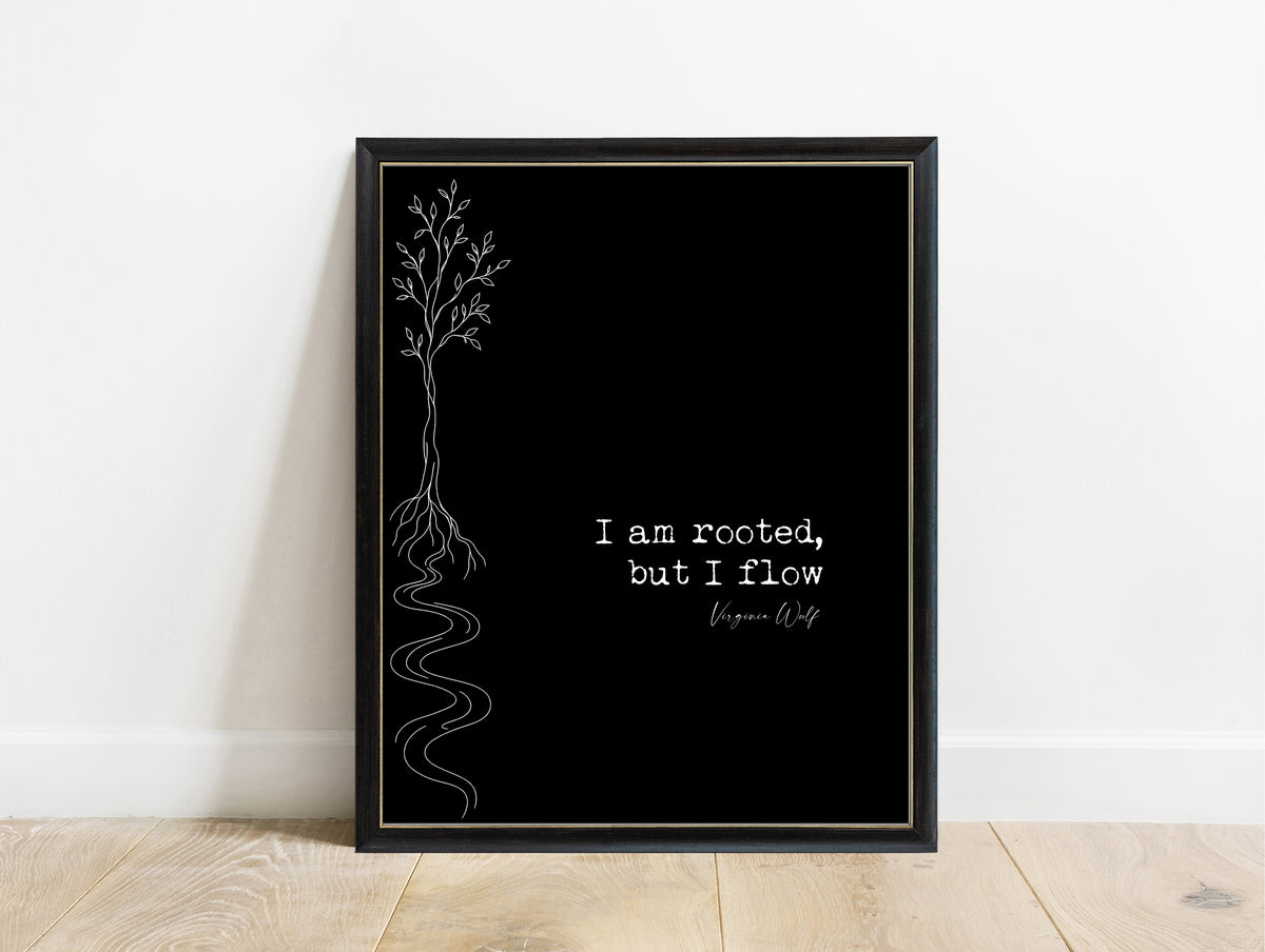 Virginia Woolf I am rooted, but I flow quote print with a line art tree whose roots become a river, black background, in a black frame