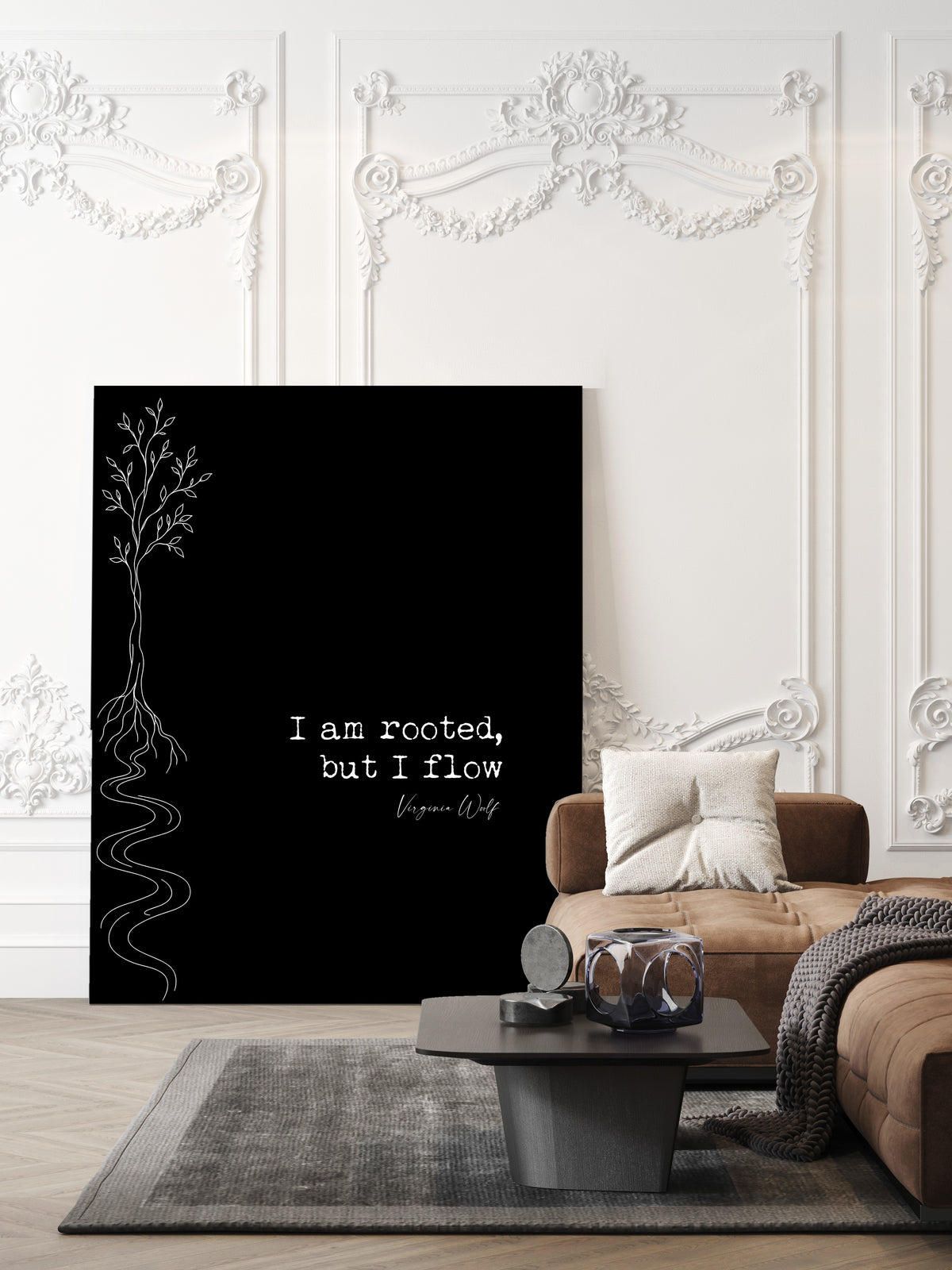 Virginia Woolf I am rooted, but I flow quote print with a line art tree whose roots become a river, black background, shown unframed in a living room