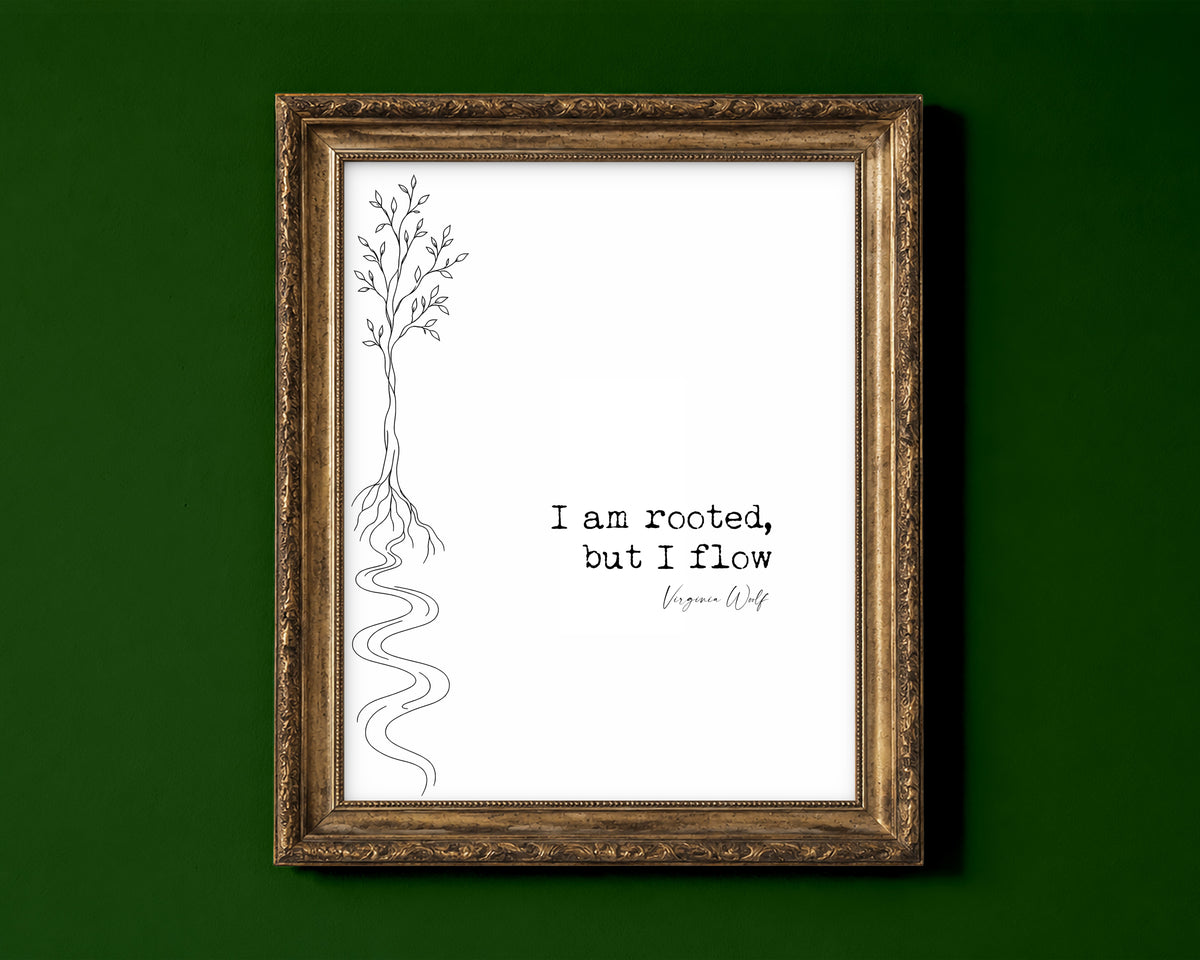 Virginia Woolf I am rooted, but I flow quote print with a line art tree whose roots become a river, white background, shown in a gold frame for display only; framed prints are sent in a black frame