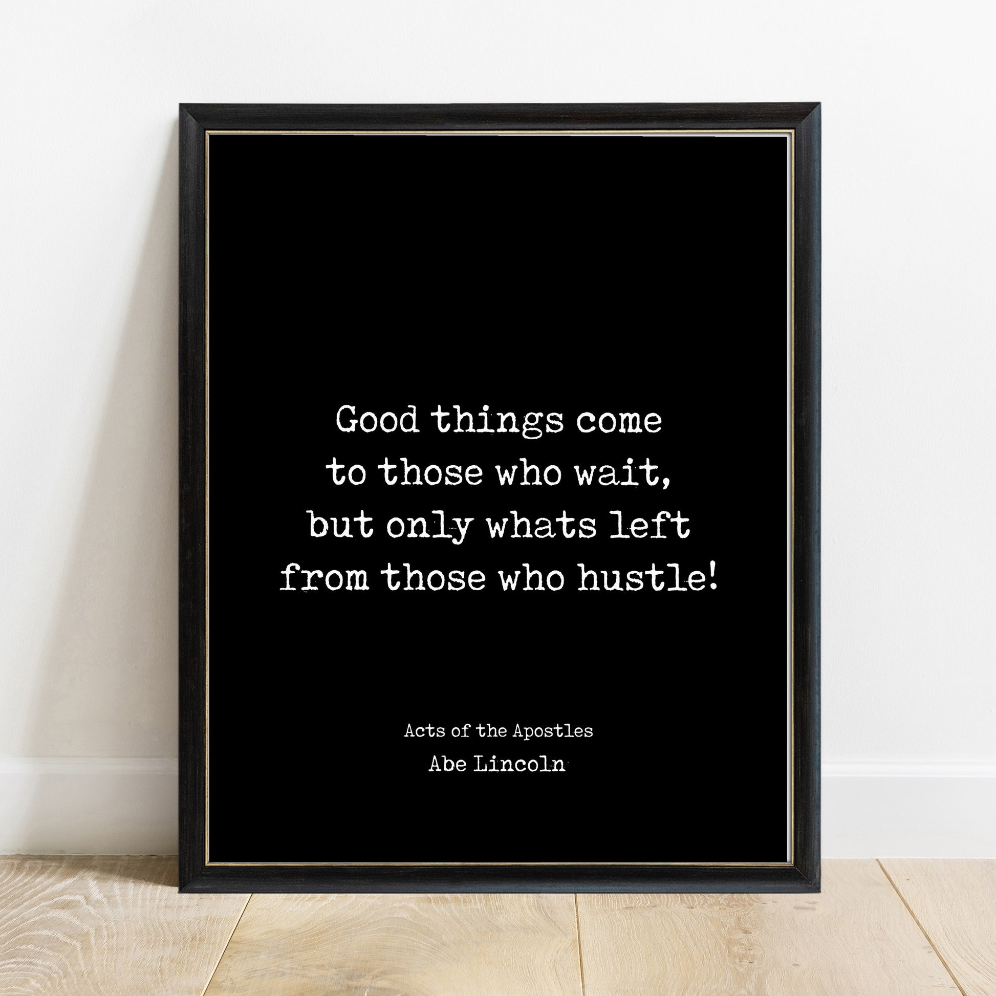 Good things come to those who hustle quote print in a black frame, black background