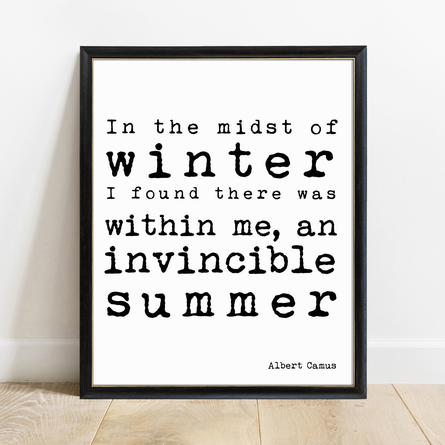 Albert Camus invincible summer quote print in a black frame, white background