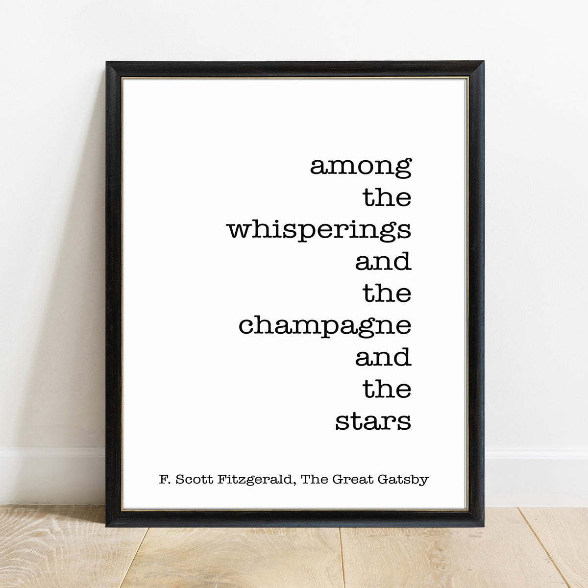 F Scott Fitzgerald among the whisperings and the champagne and the stars print in a black frame, white background