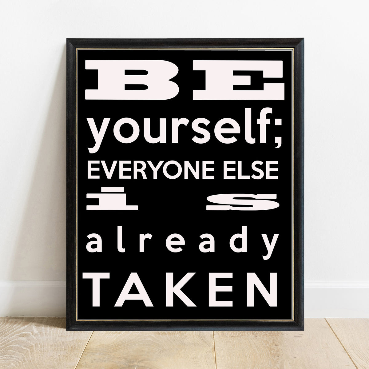 Oscar Wilde be yourself everyone else is already taken modern quote print in a black frame, white background