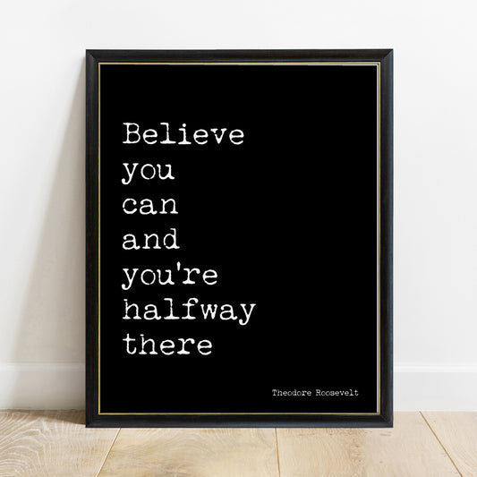 Theodore Roosevelt believe you can and you're halfway there quote print in a black frame, black background