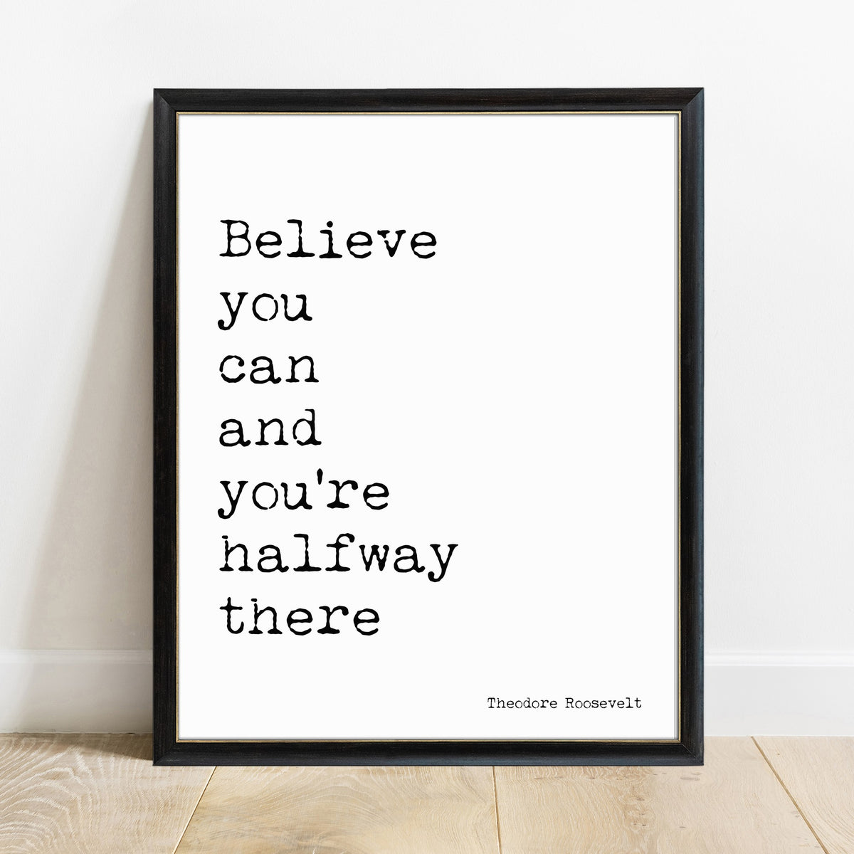 Theodore Roosevelt believe you can and you're halfway there quote print in a black frame, white background