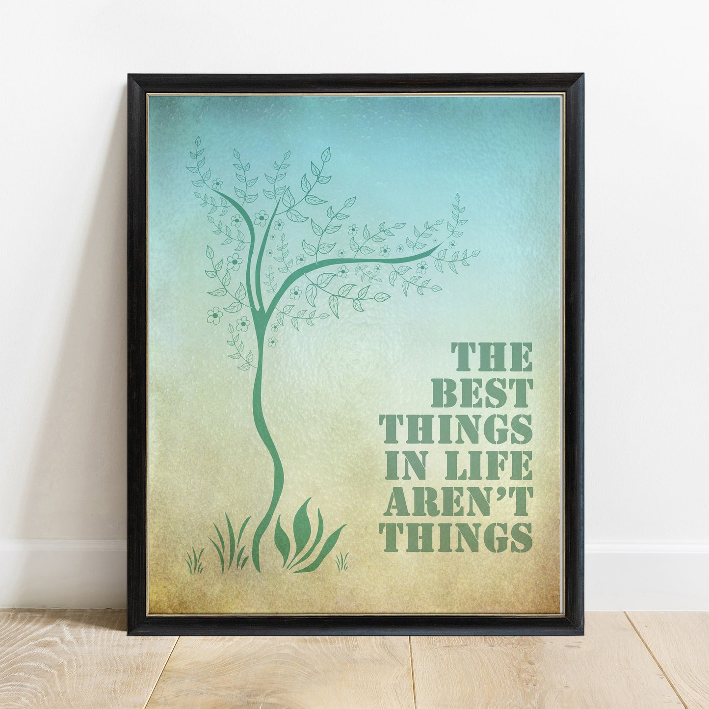 The best things in life aren't things Art Buchwald watercolour tree print in a black frame, white background