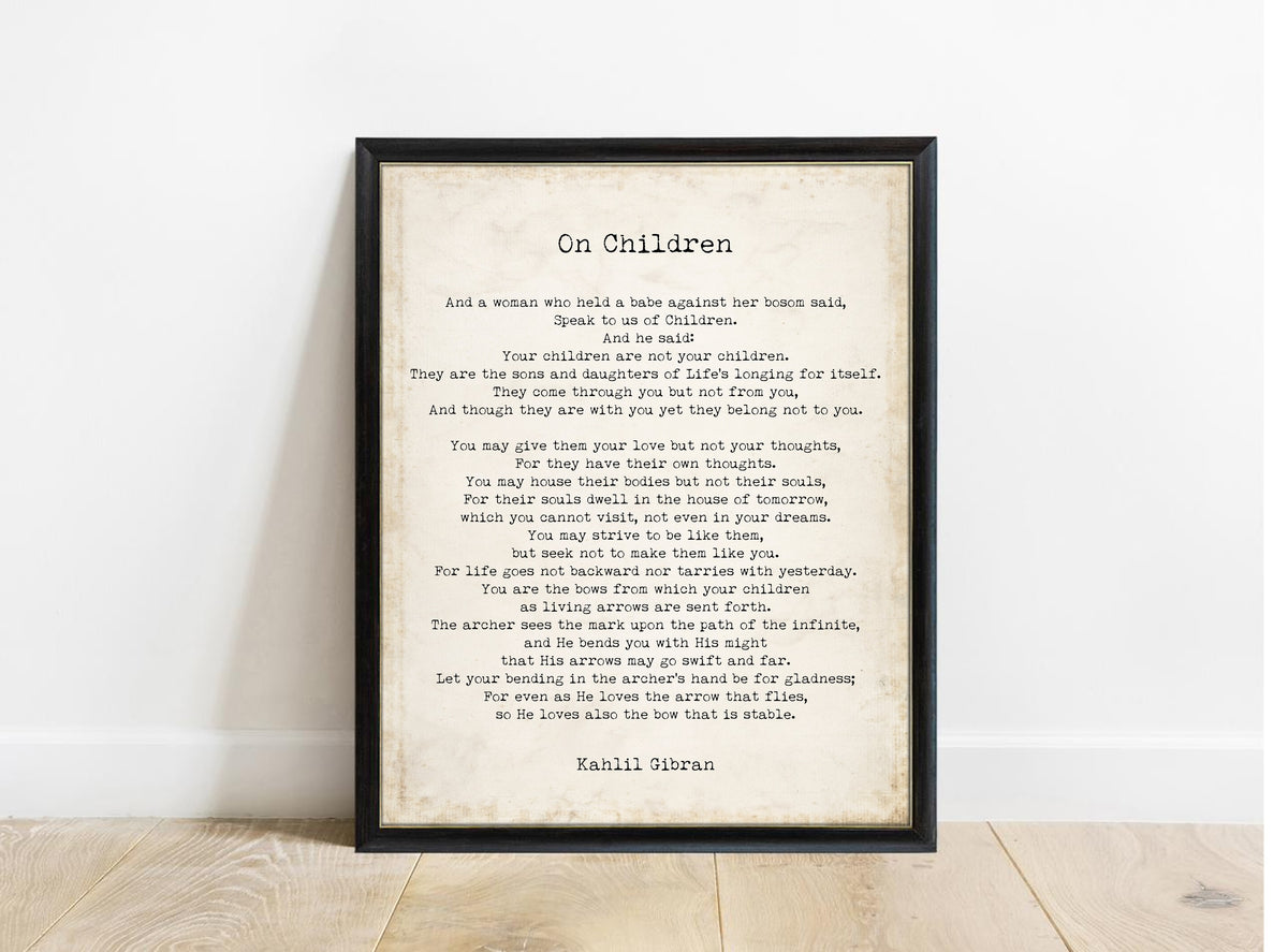 Kahlil Gibran On Children poem print in a black frame, vintage background