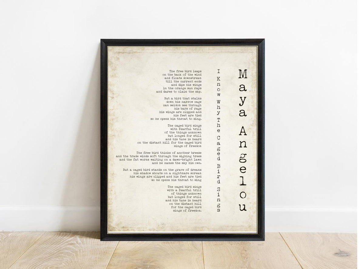 Maya Angelou Caged Bird poem print in a black frame, vintage background