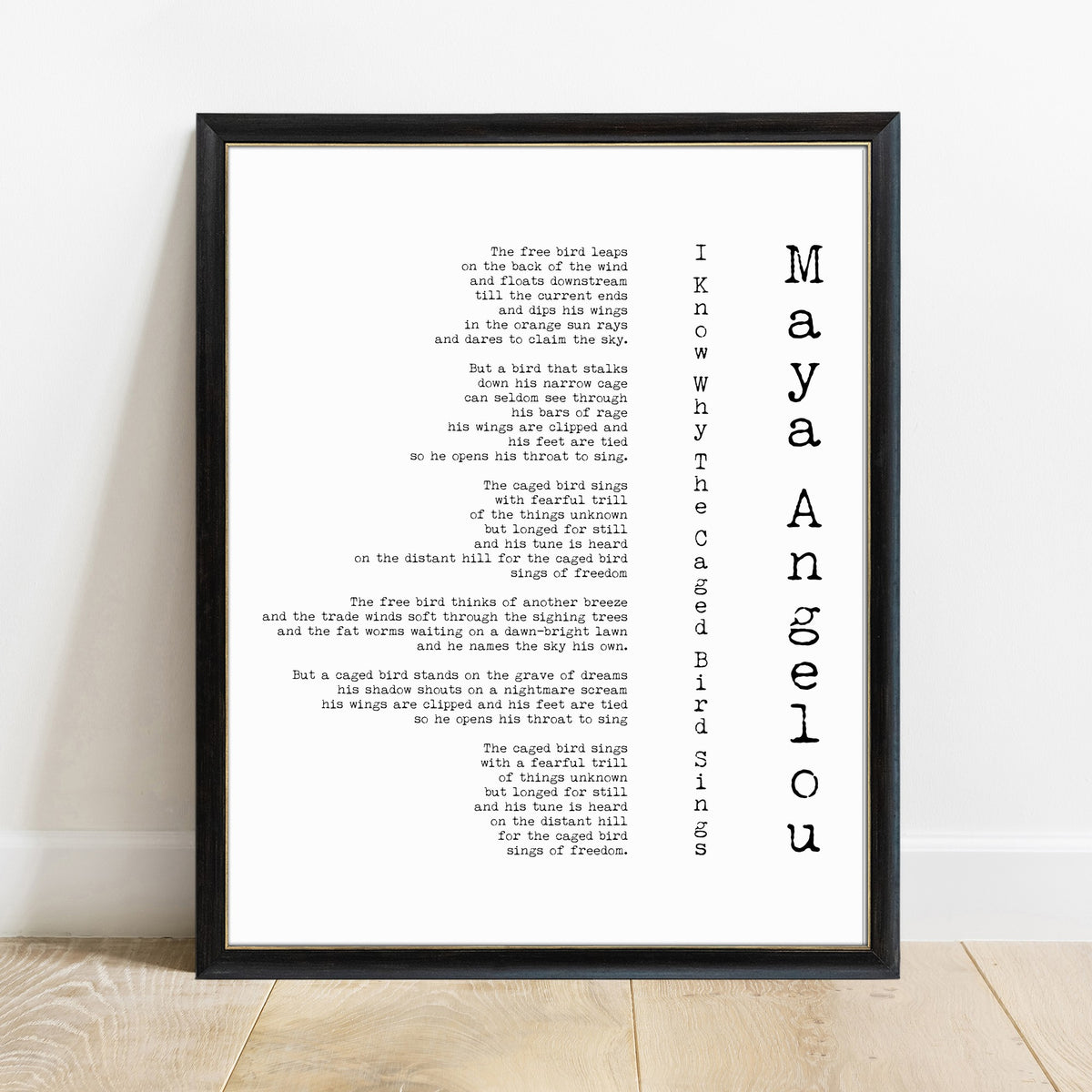 Maya Angelou I Know Why the Caged Bird Sings poem print in a black frame, white background