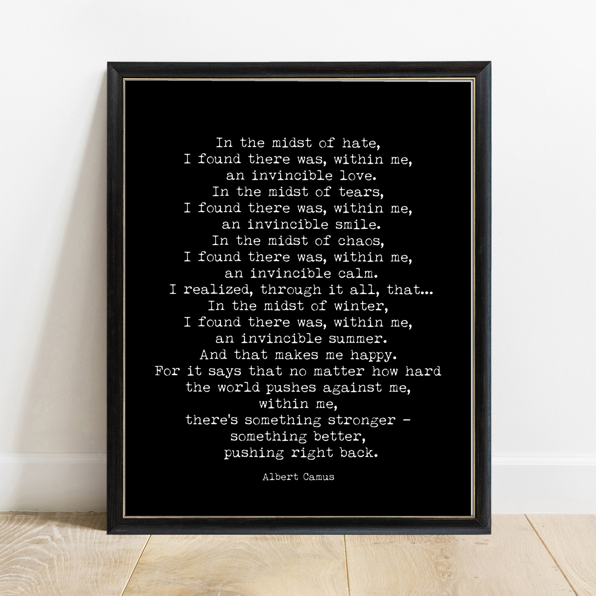 Albert Camus invincible summer full verse print in a black frame, black background
