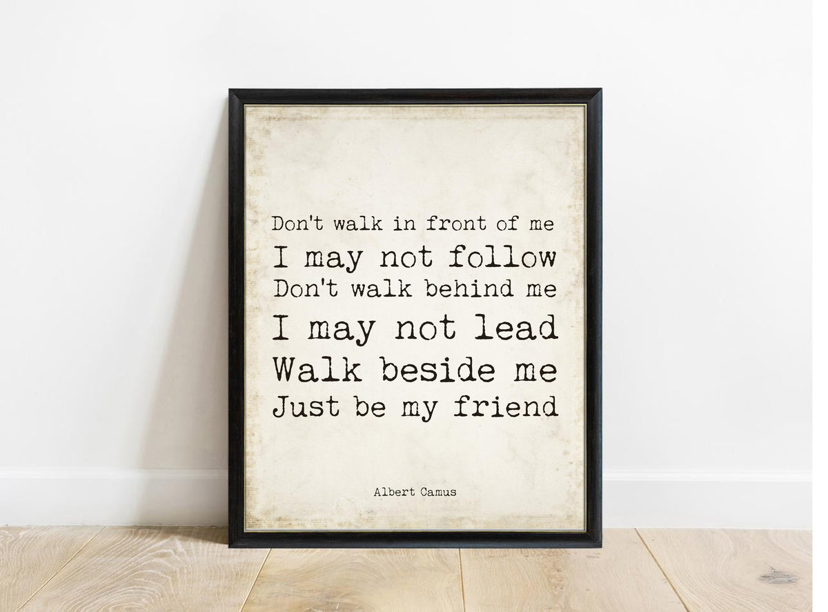 Albert Camus Walk Beside Me stacked typewriter print in a black frame, vintage background