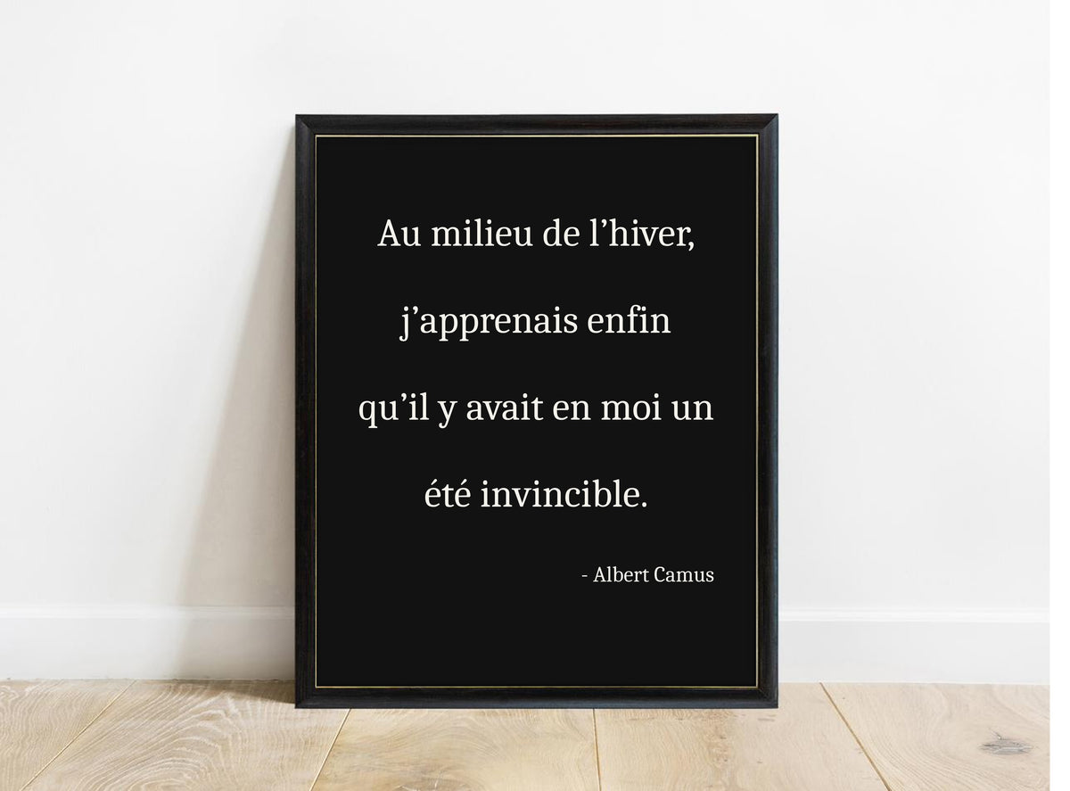 Albert Camus Un Ete Invincible French serif print in a black frame, black background