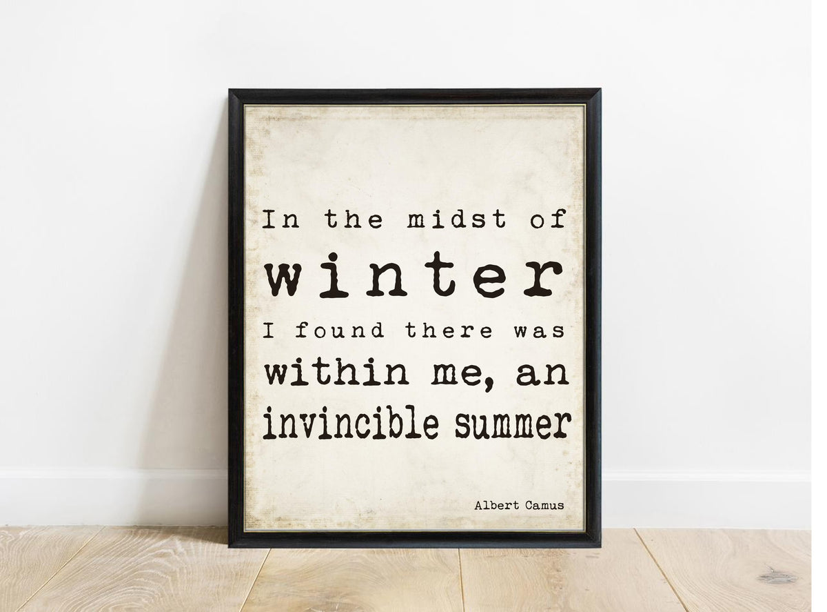 Albert Camus In the Midst of Winter bold typewriter print in a black frame, vintage background