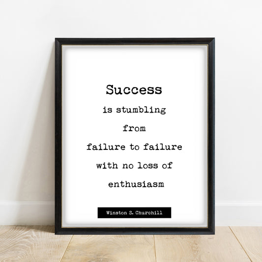 Winston Churchill Success Is Stumbling print in a black frame, white background