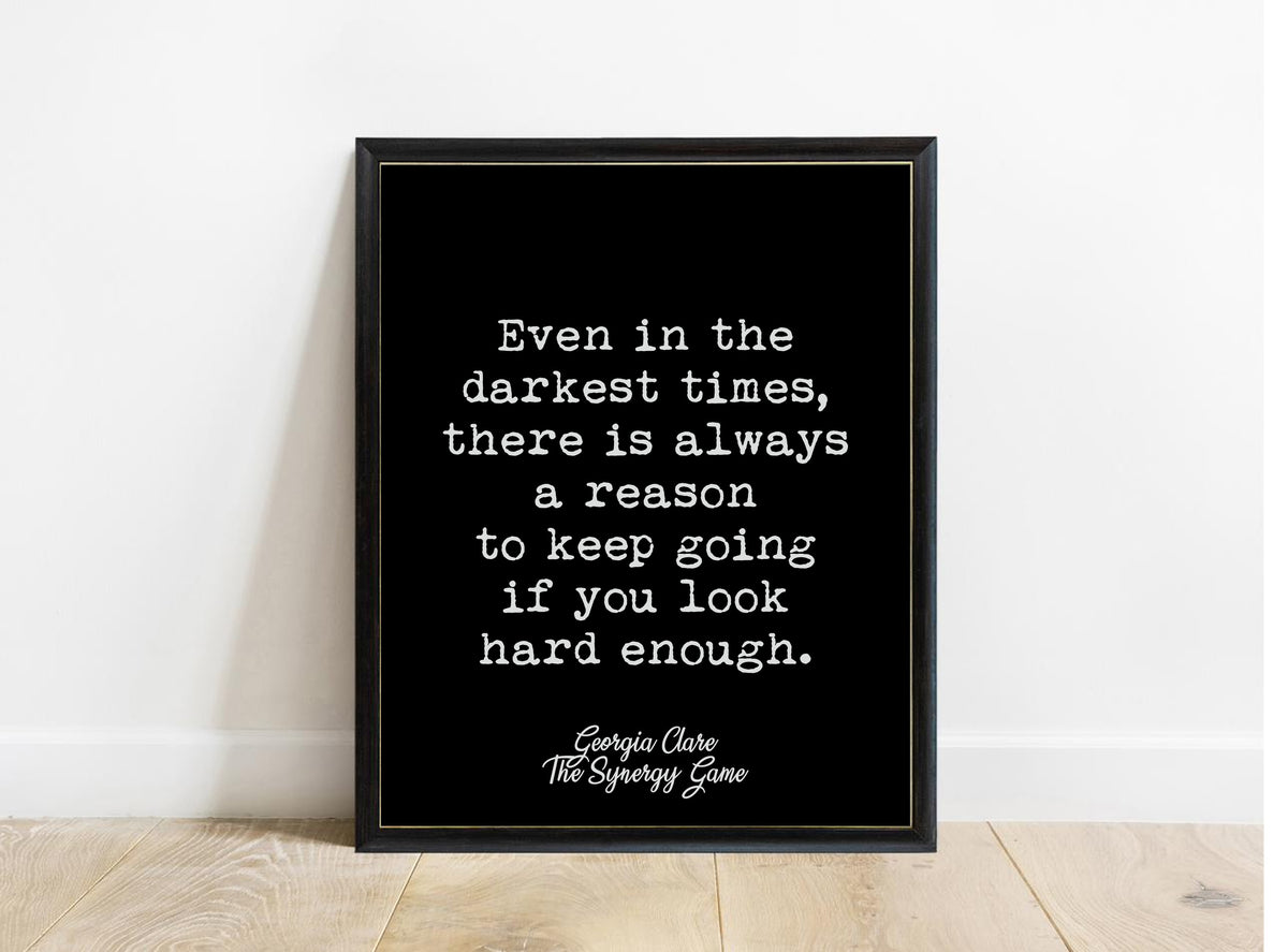 Georgia Clare Even in the Darkest Times print in a black frame, black background