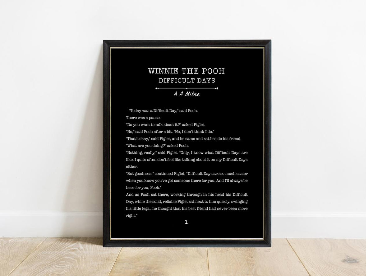 Winnie the Pooh Difficult Days book page print in a black frame, black background
