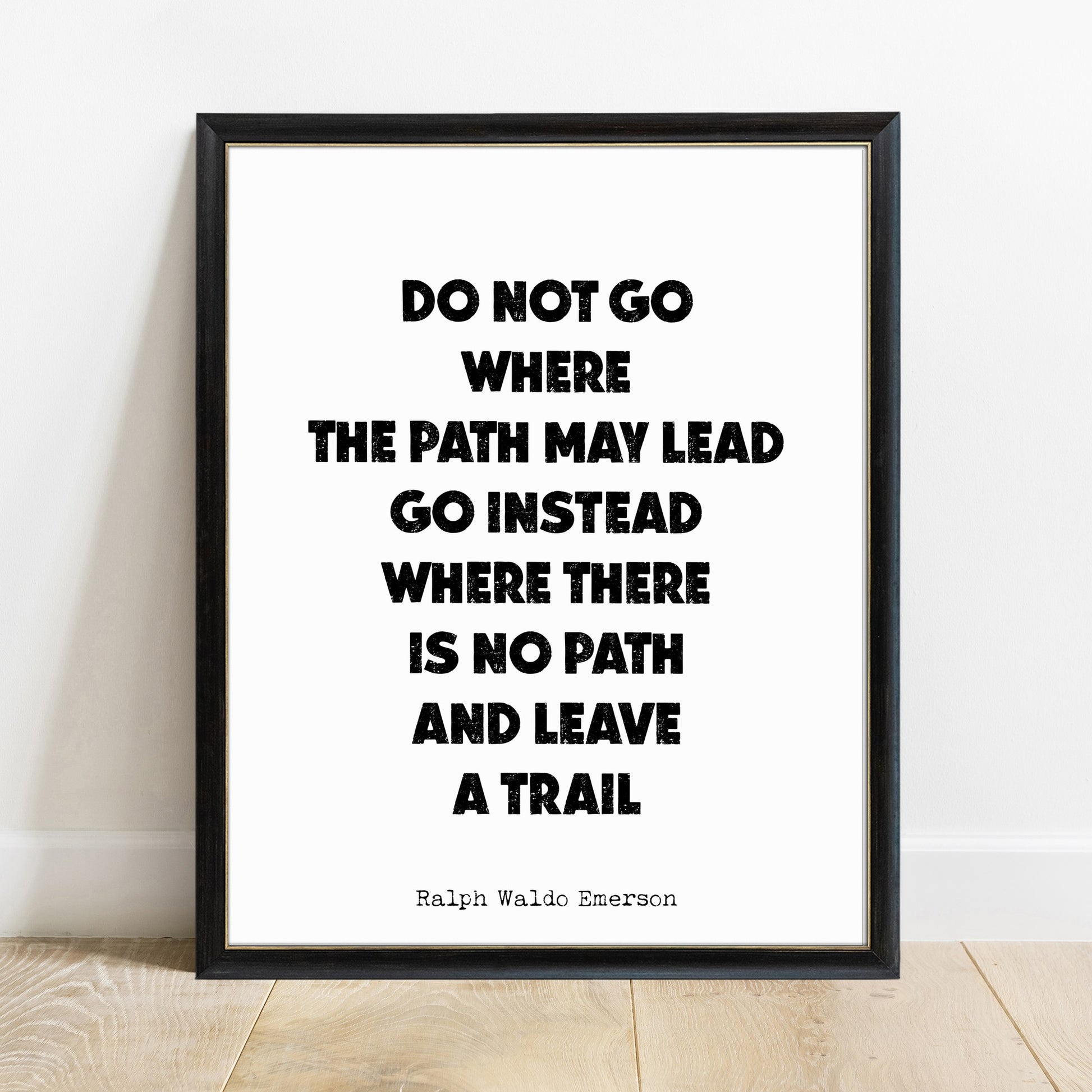 Emerson do not go where the path may lead print in a black frame, white background