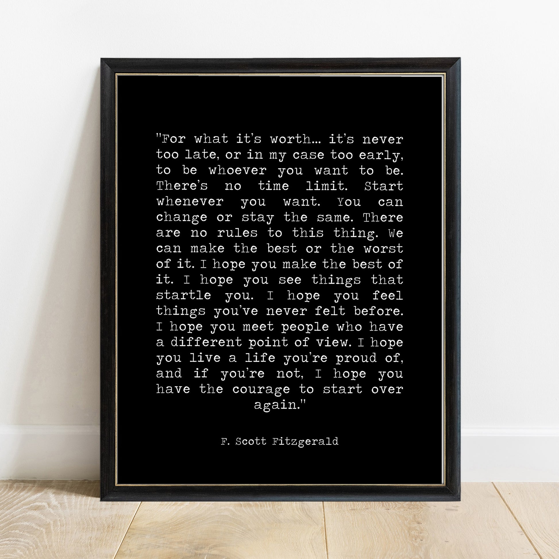 F Scott Fitzgerald for what it's worth quote print in a black frame, black background
