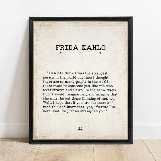 Frida Kahlo strangest person vintage book page print in a black frame