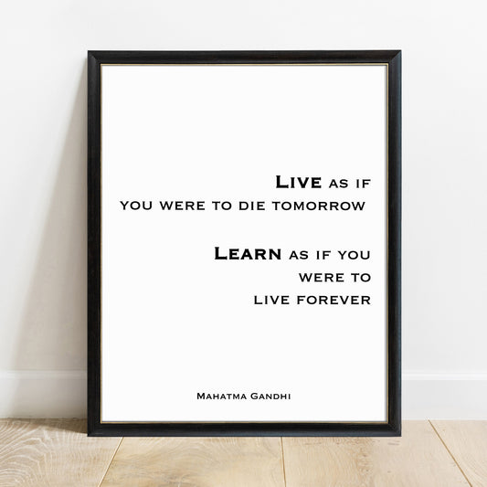 Gandhi live as if you were to die tomorrow print in a black frame, white background