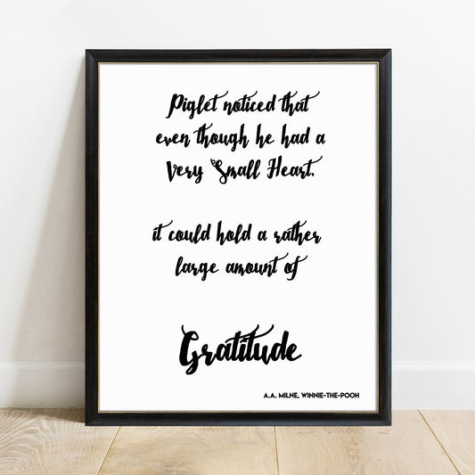 Winnie the Pooh gratitude quote print in a black frame, white background