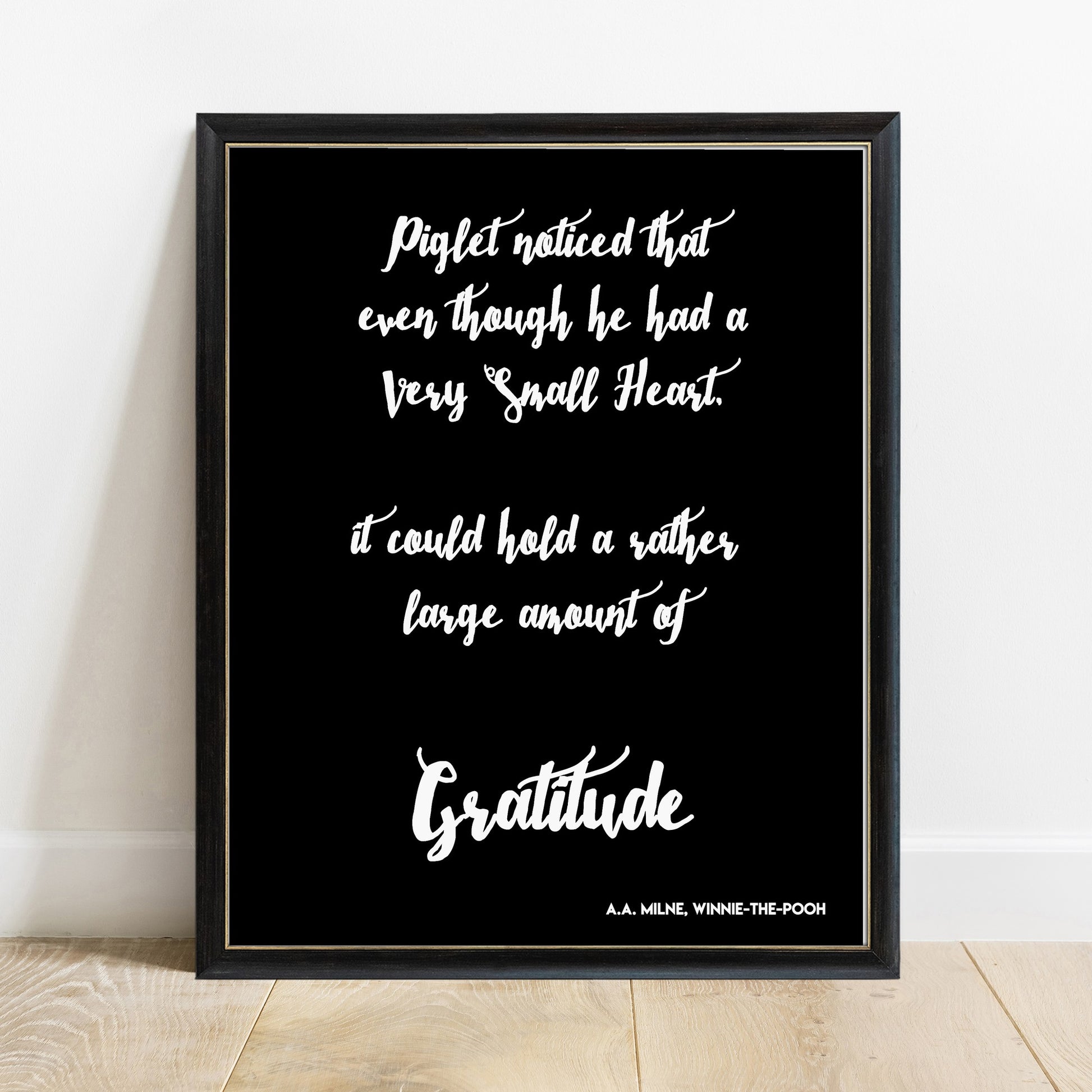 Winnie the Pooh gratitude quote print in a black frame, black background