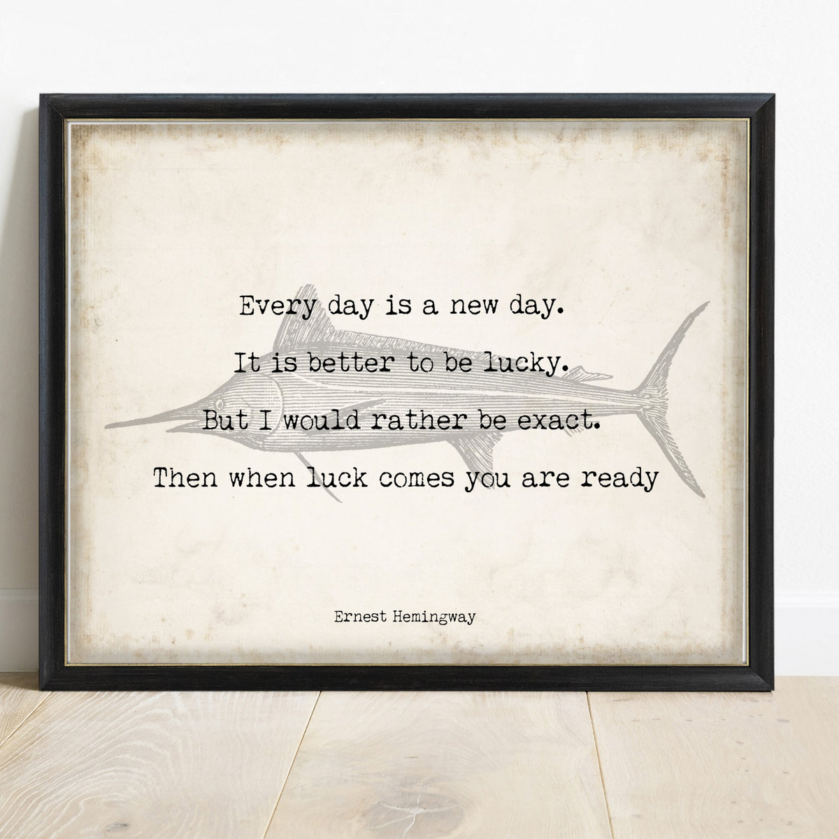 Ernest Hemingway every day is a new day quote print with marlin sketch in a black frame, vintage background