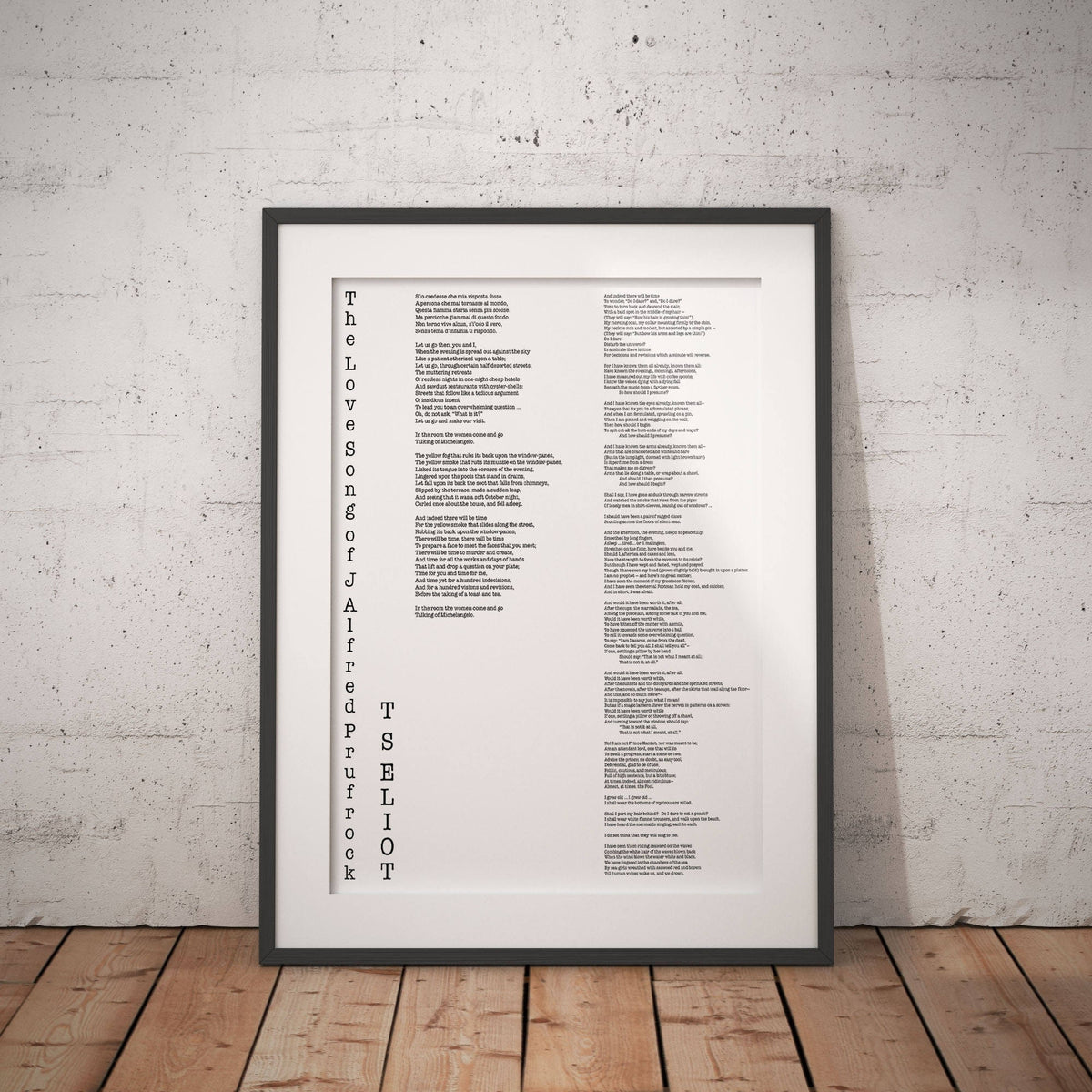 May include: A black framed print of a poem titled 'The Love Songs of J. Alfred Prufrock' by T.S. Eliot. The poem is printed in a typewriter font and is centered on the page. The poem is a classic of modern literature and is known for its themes of alienation, anxiety, and the search for meaning in a modern world.