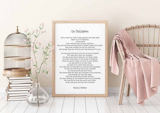 May include: A framed print with a white background and black text. The text is a poem by Kahlil Gibran titled "On Children". The poem is about the relationship between parents and children.