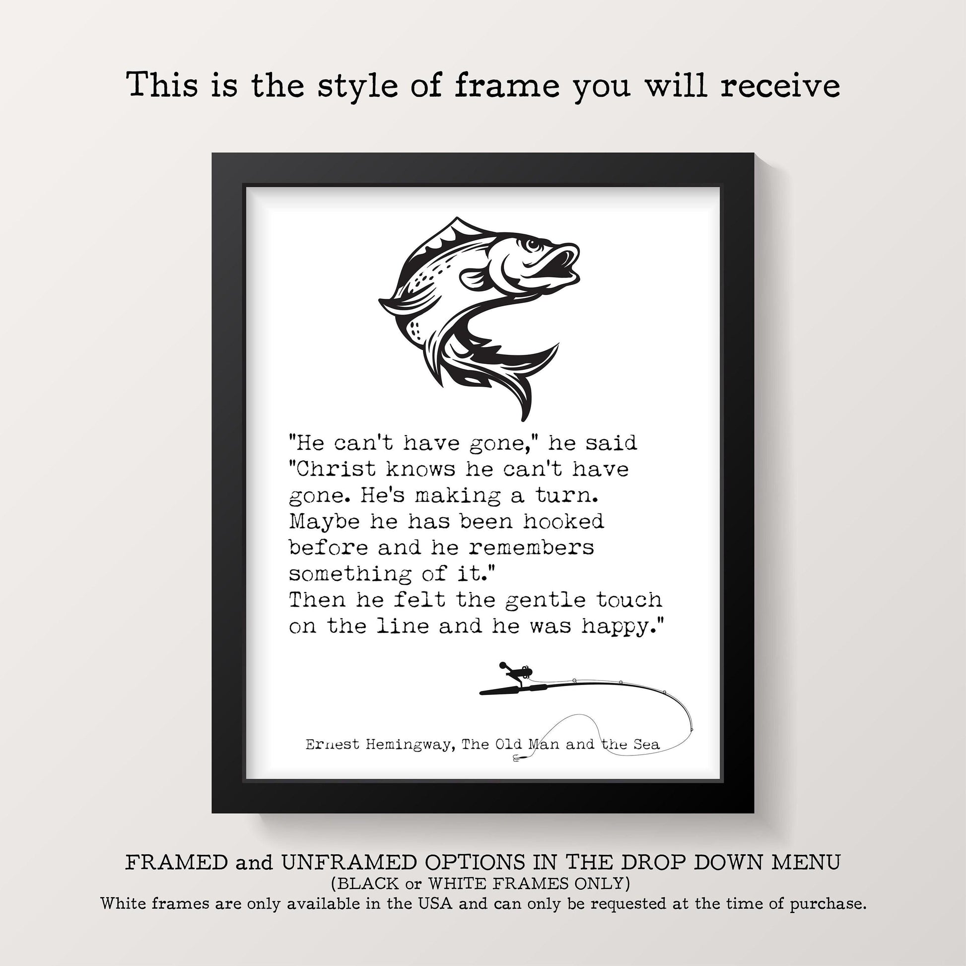 A framed print with a black border features a black-and-white illustration of a fish above a quote from Ernest Hemingway's "The Old Man and the Sea."