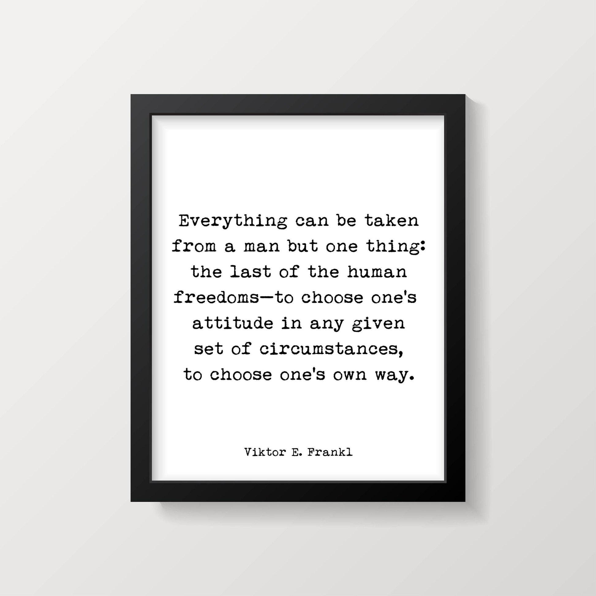 A framed white print with black text, "Everything can be taken from a man but one thing: the last of the human freedoms—to choose one's attitude in any given set of circumstances, to choose one's own way. Viktor E. Frankl," is shown on a white