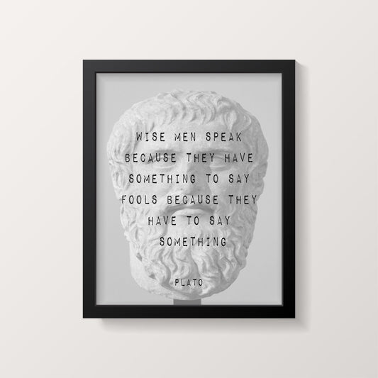 A black framed print features a white marble bust of Plato with the quote "WISE MEN SPEAK BECAUSE THEY HAVE SOMETHING TO SAY FOOLS BECAUSE THEY HAVE TO SAY SOMETHING PLATO" in black text.